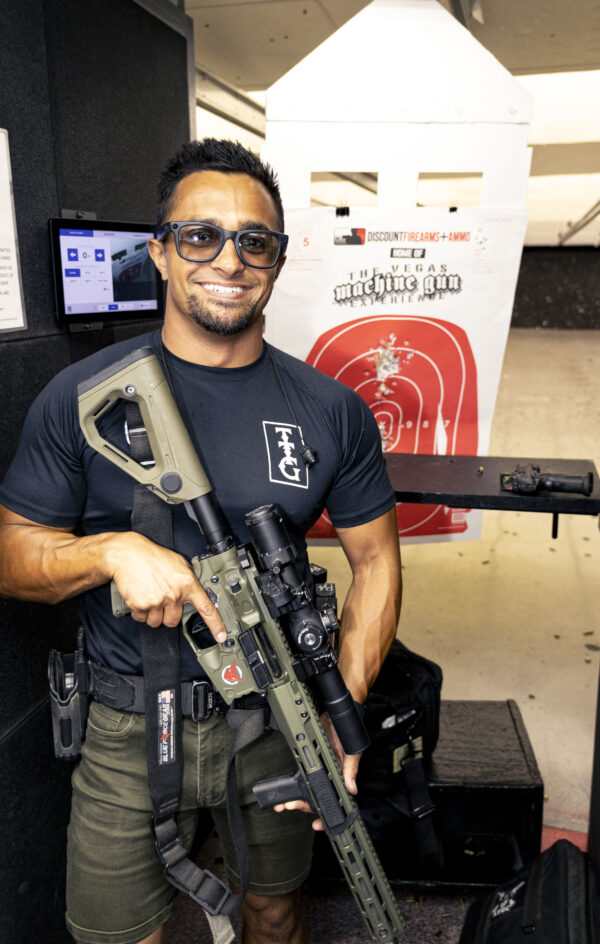 Guest holding a rifle at The Vegas Machine Gun Experience